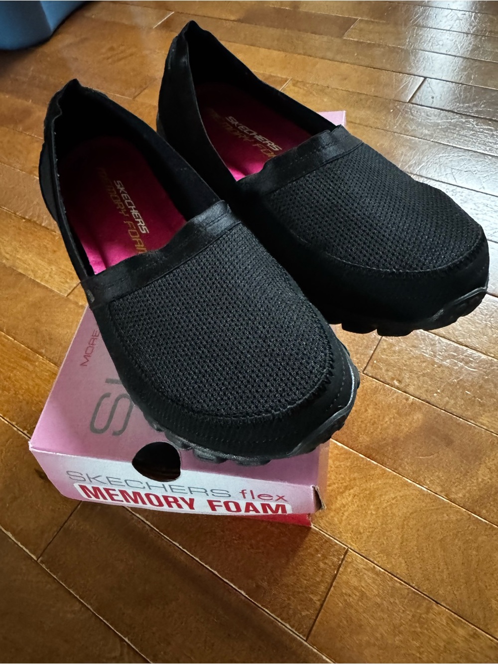 Skechers Women's Black Slip-On Athletic Shoe with Pink Insole